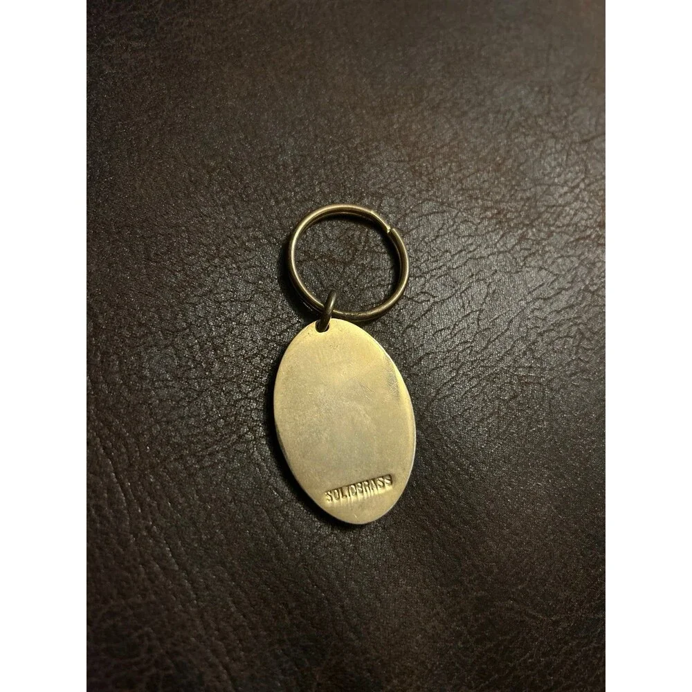 Vintage Dodge caravan, gold keychain
